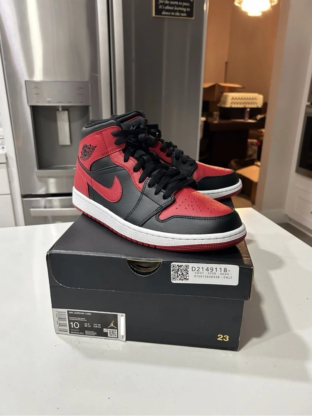 Nike Air Jordan 1 Mid Black and Red Sneakers